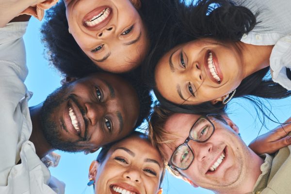 Trust, happy and friends portrait huddle for bonding, hug and summer fun together with smile. Adven.